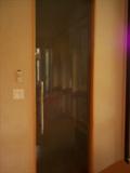 Just one of many glass doors w/ stainless handles throughout this home, sizes are appx 30" x90"
