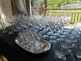 TABLES FULL OF CUT, PRESSED AND DECORATIVE ITEMS