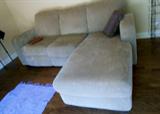 A great love seat with chaise lounger comes in two pieces for easy moving and arranging in your home