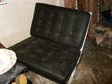 LUDWIG MIES VAN DER ROHE/ BARCELONA CHAIR BLACK LEATHER ON POLISHED STEEL FRAMES.