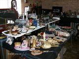 4 TABLES FULL OF JEWELRY, DRESSER ITEMS, BRONZE BOOK ENDS, CENT. OF PROGRESS ITEMS, LIGHTERS, & SO MUCH MORE, VERY VINTAGE MINNIE MOUSE DOLL