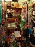 Scarves, phone carrier bags, jeweled pins and accessories are still available, as are the shelf units.