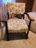 Vintage mahogany arm chair with crewel work seat and back