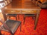 Fold-up dining table.  Closes into a small console table, chairs and leaves store inside.