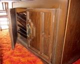 Fold-up dining table.  Closes into a small console table, chairs and leaves store inside.