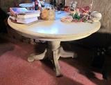 Solid oak pedestal table.  Was painted white.
