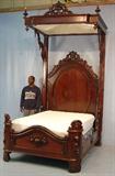 304 - Rosewood half tester bed in mint condition, att. To Mitchell and Rammelsberg, has original mosquito net hardware, 10ft 10in. T, 59in. W, 80in. L.