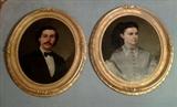 651 - Oil on canvas portraits of man and woman in oval Victorian frames, signed and dated 1872, 36in. T.