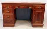 340 - Mahogany Victorian flat top desk with leather insert and secret compartment, 32in. T, 54in. W, 32in. D.