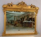 341 - Victorian rococo over the mantle mirror with ornate details, 55in. T, 60in. W.