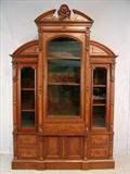 343 - Victorian walnut breakfront bookcase with butler's desk with unusual crest, 8ft 9in. T, 17in. D, 69in. W.