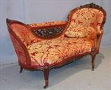 430 - Rococo rosewood recamier with red and gold silk upholstery, pierce carved back, 39in. T, 68in. W, 29in. D.