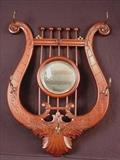356 - Walnut Victorian lyre shaped hanging hat rack, 30in. T, 22in. W.
