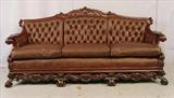 563 - Solid mahogany heavily carved French rococo sofa with brown leather in mint condition, ca. 1890, 82in. L, 41in. T, 31in. D.