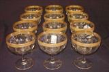 411 - Set of 12 shrimp cocktail glasses with gold rim.