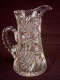 502 - American brilliant cut glass pitcher, 10.5in. T., 9in. From spout to handle.