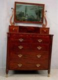 522a - Flame mahogany period empire dresser with cookie corners and scroll front with glove box and mirror, 65in. T, 39in. W, 20in. D.