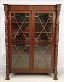 524 - Mahogany acanthus carved empire china cabinet with individual glass panel doors, acanthus column and claw feet., 62in. T, 45in. W, 15in. D, ca. 1845.