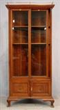 539 - Walnut Victorian corner bookcase with sliding doors and brass gallery, ca. 1890, 71in. T, 30in. W, 22in. D, ca. 1890.