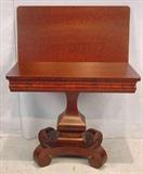 540 - Mahogany empire pumpkin base game table with scroll feet, 28in. T, 34in. W, 17in. D.