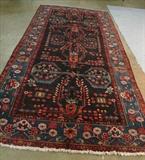 551 - Hand made Persian rug, 5ft 7in x 13ft.
