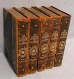 552 - Five old leather bound books.