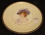 137 - Small plate, Red Lion Mark, Gibson Girl in blue hat.