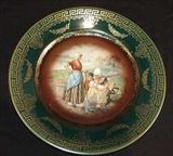 152- Royal Vienna plate with beehive mark, family with small baby.