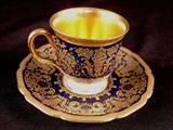 171 - Rosenthal Demitasse C & S gold and cobalt with roses.