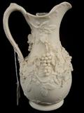 178 - Parisian ware pitcher, decorated with grapes and leaves, 8in . T, Bennington type.