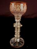 232 - Moser rose color wine goblet with gold trim.
