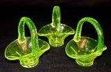 231 - Three small Vaseline glass baskets