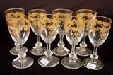 230- Set of 8 cordials trimmed with gold St. Louis crystal glasses.