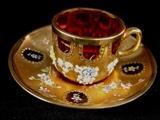 240 - Moser glass demitasse cup and saucer, dark ruby red with lots of gold applied.