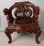 252 - Chinese chair carved with reptile arms and head, rounded back, seat 31in. T, 26in. W, ca. 1890 - 1920.