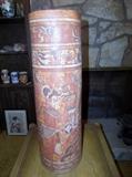Mayan vase 24 inches tall and 7 inches across at top and widens to 8 inches at the bottom