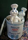 Pillsbury tin flour can with Pillsbury Dough Boy dolls