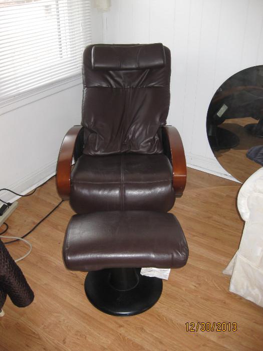 This is a fabulous electric chair!  It massages your back with several settings and comes with an ottoman too!