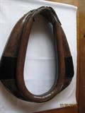 This horse collar/hames was my grandfather's from the early 1900's, of which my father used as well. All leather with buckles at the top and wood trim. It's in very good condition.