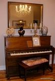 Baldwin Upright Piano with Stool and music, gilt mirror above