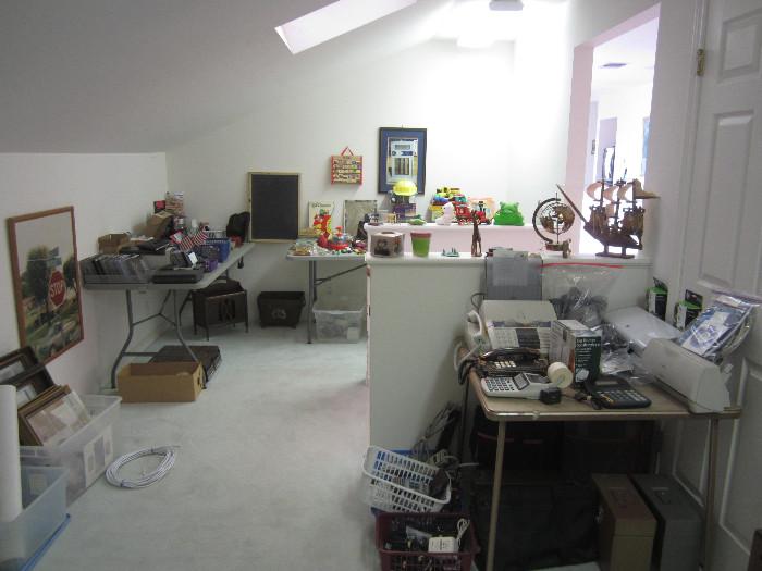 This is the upstairs office.  It has the toys and the rocks are in the box near the table on the left. 