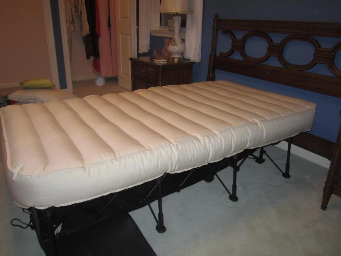 Now this is a Twin Size Frontgate Inflatable Bed.  It practically blows itself up! We have two!