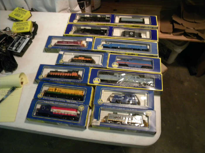AHM HO :  American RR Locomotive, Southern Pacific Locomotive, Great Northern RR Locomotive & car, Rock Island, B&O, Milwaukee, Chicago & Eastern cars, Loco Center cab, Reading, Conrail 35 ton switcher, Norfold & Western. Erie cars.