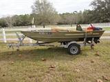 14ft, Lowe Jon Boat, with 15 horse Evinrude Motor and Magic Tilt trailer... Ready for fishing