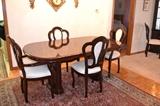 Italian-made, cherry dining room set with six chairs, very clean and in great condition.