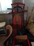 sleds and a vintage highchair