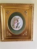 one of a pair of porcelain relief framed pieces