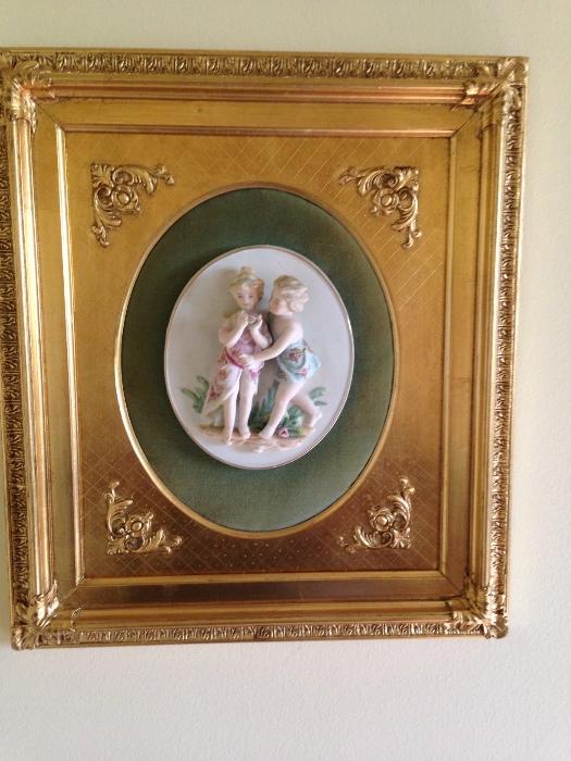 one of a pair of porcelain relief framed pieces