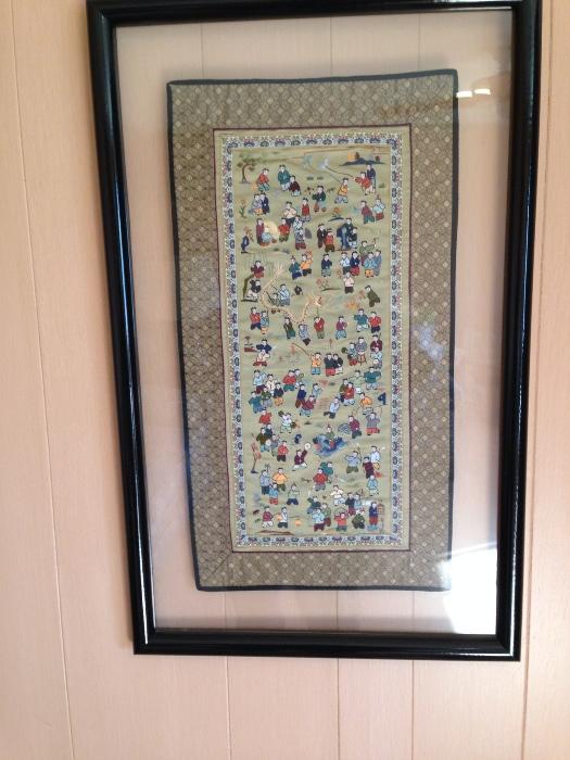 asian embroidered piece that is framed in a floating style