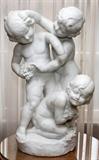 Lot#1005, CARVED CARRARA MARBLE SCULPTURE OF CHERUBS, H 24", W 16"Not signed. Carved in Italy from a single white Carrera marble, three cherubs with grape bunches.